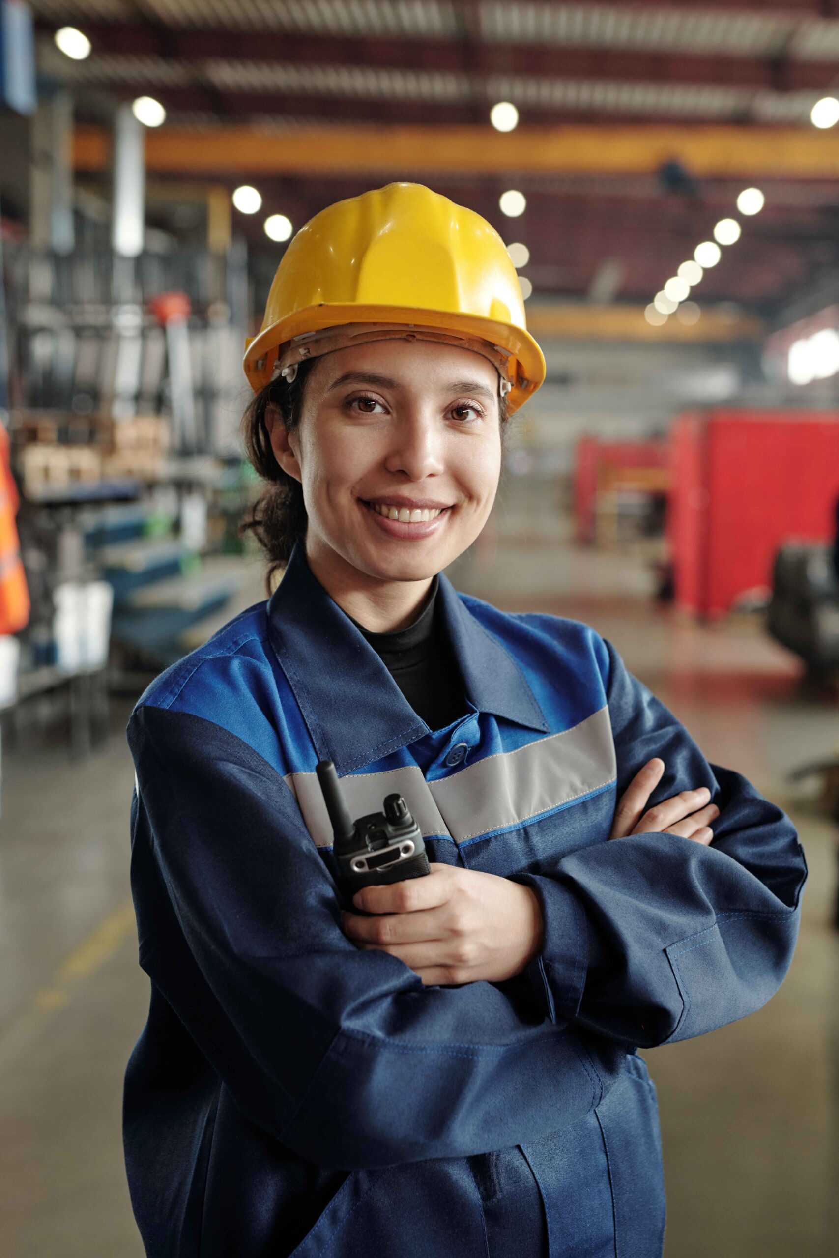 young-successful-female-worker-modern-industrial-plant-workwear-protective-helmet-standing-front-camera-large-workshop_11zon